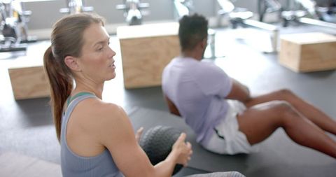 Fit Individuals Training with Medicine Balls in Modern Gym - Download Free Stock Images Pikwizard.com