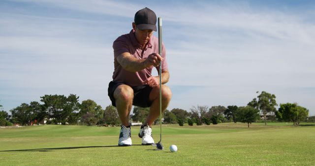 Male Golfer Aiming Shot on Sunny Golf Course - Download Free Stock Images Pikwizard.com