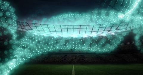 Glowing particles creating dynamic patterns in stadium