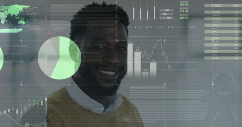 Smiling Professional Amidst Data Analytics Display