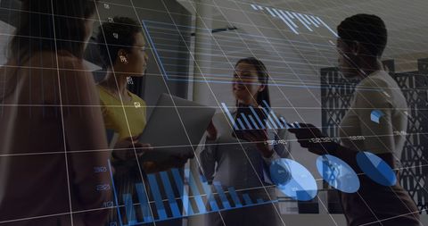 Business team discussing financial data and analytics in modern office