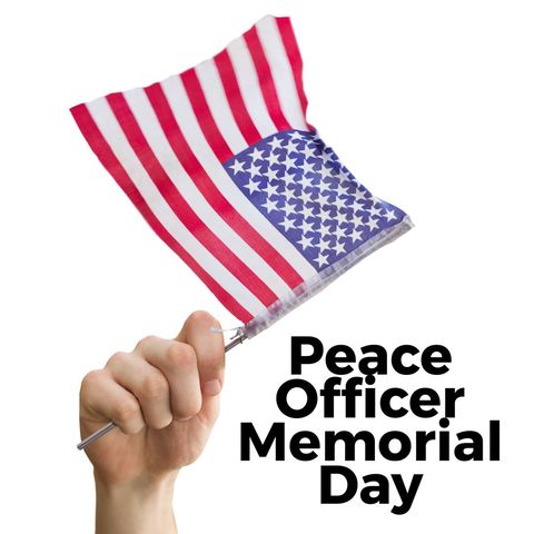 american flag held by hand on peace officer memorial day - Download Free Stock Templates Pikwizard.com