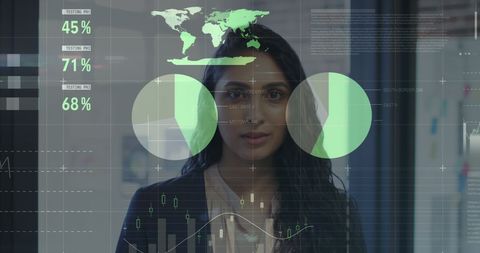 Businesswoman analyzing financial data in modern office environment