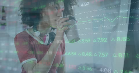 Woman Studying Graphs with Data Overlay