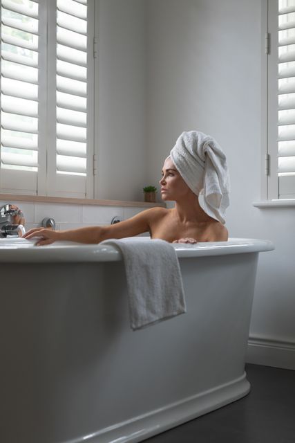 Perfect for promoting bath products, self-care routines, interior design ideas, or lifestyle blogs focusing on relaxation and home comforts. Ideal imagery for wellness campaigns and advertisements targeting personal care.