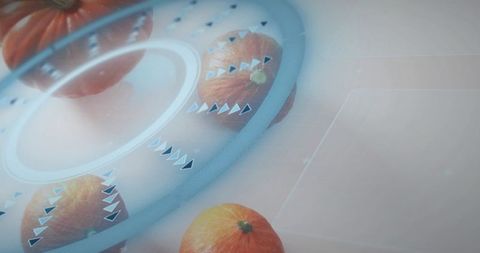 Mini orange pumpkins with futuristic cyan holographic interface and tech overlay