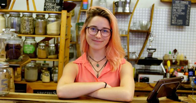 Young Female Barista with Glasses Working Behind Coffee Shop Counter - Download Free Stock Images Pikwizard.com