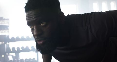 Intense Focus Push-up Exercise African American Athlete