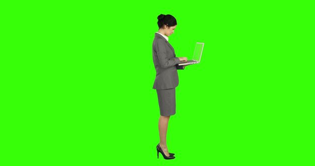 Businesswoman Typing on Laptop, Full Length Profile, Green Screen Background - Download Free Stock Images Pikwizard.com