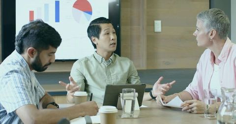 Business Meeting Presentation with Team Collaboration and Data Analysis