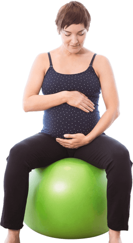 pregnant woman balancing on green exercise ball doing prenatal workout - Download Free Stock Videos Pikwizard.com