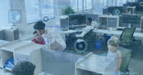 Diverse Team Engaging with Financial Data in Modern Office