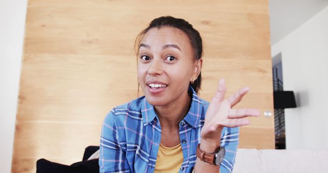 Smiling Woman Talking and Gesturing Indoors - Download Free Stock Images Pikwizard.com