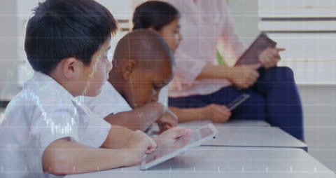 Diverse Students Engaged with Technology in Classroom Setting