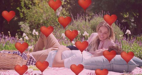 Diverse Couple Relaxing at a Romantic Garden Picnic