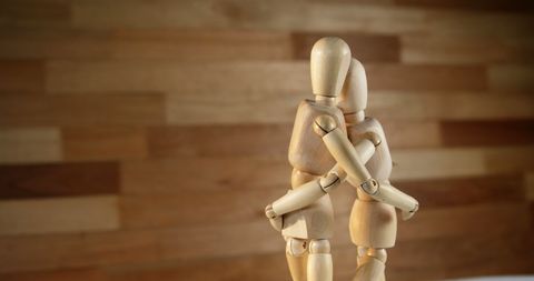 Wooden Art Figures in an Emotional Embrace - Download Free Stock Images Pikwizard.com