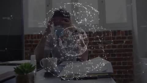 Stressed Businessman at Desk with Futuristic Holographic Network