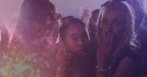 Energetic Nightclub Party Celebration with Purple Strobe Lights