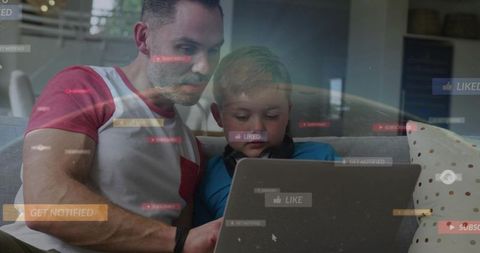 Father guiding son using laptop on couch with social media overlays and globe reflection