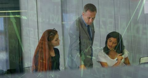 Business Meeting with Financial Chart Overlay Under Analysis