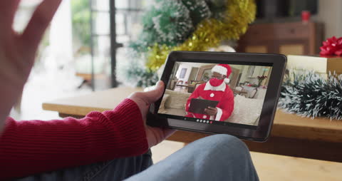 Virtual Holiday Greetings with Santa Claus on Tablet