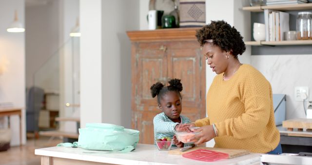 Mother and Daughter Preparing Healthy Snack in Home Kitchen - Download Free Stock Images Pikwizard.com