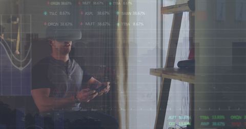 Disabled Man Using VR Headset with Stock Market Overlay