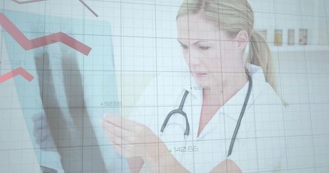 Female Doctor Analyzing Digital Data with Graphs