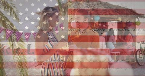 Couple Enjoying Summer Beach Drink with American Patriotic Theme