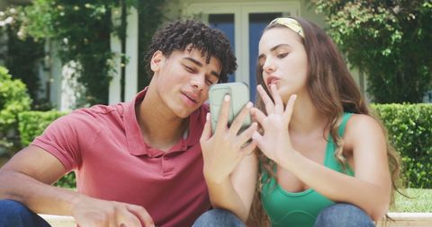 Young Mixed-Ethnicity Couple Using Smartphone Outdoors - Download Free Stock Images Pikwizard.com