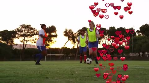 Young Female Soccer Player Dribbling with Floating Hearts Effect