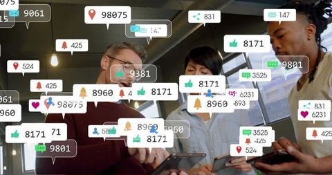 Team collaborating with smartphones and tablet surrounded by social media notifications