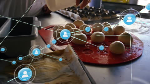 Chef Preparing Bread Rolls with Digital Networking Overlay