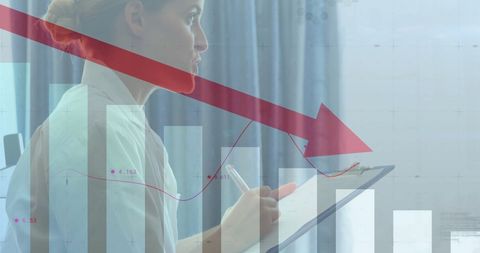 Businesswoman analyzing financial decline on clipboard