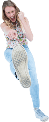 young woman displaying a dynamic and powerful karate kick, exuding confidence and energy. transparent background makes this image ideal for use in articles about martial arts, self-defense classes, women's fitness, and empowerment campaigns. great for promotional materials and motivational posters focusing on strength and determination.