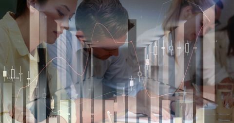 Business professionals analyzing financial data trends