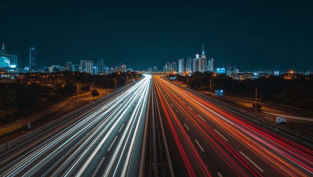 Dynamic Urban Freeway with Light Trails at Night
