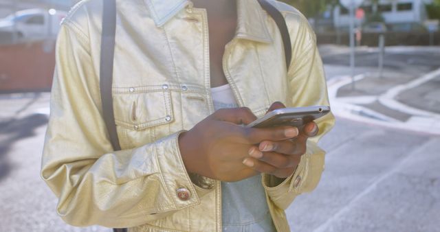 Person Texting Outdoors in Urban Area - Download Free Stock Images Pikwizard.com