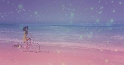 Woman riding beach cruiser along pastel shoreline at sunset with dreamy bokeh overlay