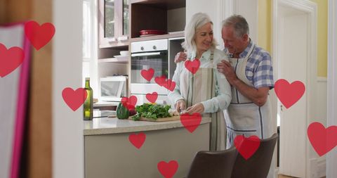 Senior Couple Enjoying Romantic Cooking Session