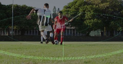 Soccer Players Competition on Field with Digital Futuristic Overlay