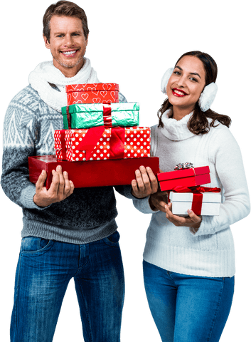 Festive couple smiling and holding colorful gifts on transparent background