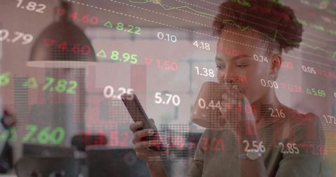 Businesswoman Analyzing Global Financial Data with Digital Interface