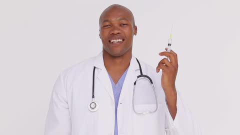 Smiling Doctor Holding Syringe Ready for Vaccination