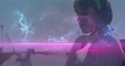 Dreamy Child with Headphones Embracing Cosmos on Riverwalk