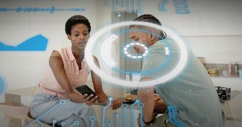 Couple Sharing Smartphone with Augmented Reality HUD over Modern Kitchen Island