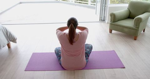 Plus Size Woman Practicing Yoga Meditation at Home Relaxation