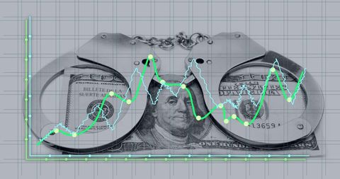 Financial Trends Analyzed with American Currency and Handcuffs