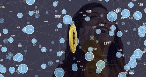 Asian woman envisioning digital gears with bitcoin connections