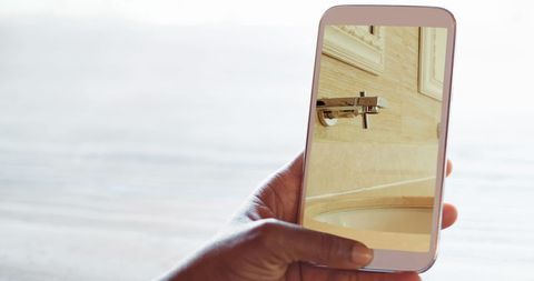 Using Smartphone to Explore Bathroom Interior Décor Online - Download Free Stock Images Pikwizard.com